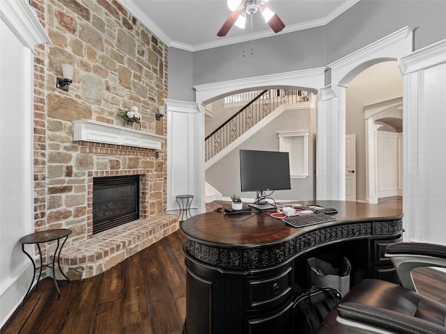 2 Pond View Ct, Mansfield, TX 76063 - office with a stone fireplace, a ceiling fan, wood finished floors, arched walkways, and ornate columns