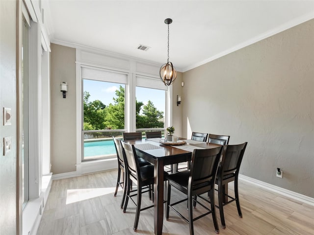 2 Pond View Ct, Mansfield, TX 76063 - dining space with ornamental molding and light wood-style flooring