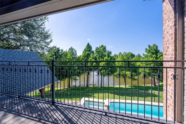 2 Pond View Ct, Mansfield, TX 76063 - gate with a water view, a pool with connected hot tub, and a yard