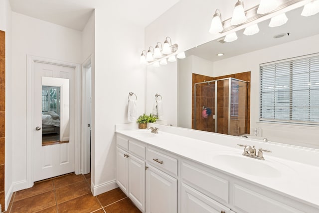 2778 Hidden Knoll Trl, Frisco, TX 75034 - ensuite bathroom featuring a stall shower, double vanity, and tile patterned floors