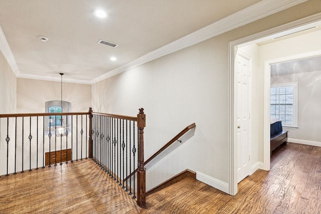 2778 Hidden Knoll Trl, Frisco, TX 75034 - staircase with ornamental molding, wood finished floors, and recessed lighting