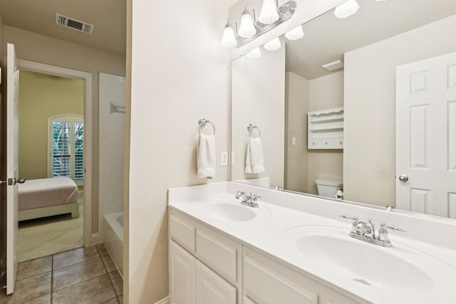 2778 Hidden Knoll Trl, Frisco, TX 75034 - bathroom with double vanity, tile patterned floors, and  shower combination