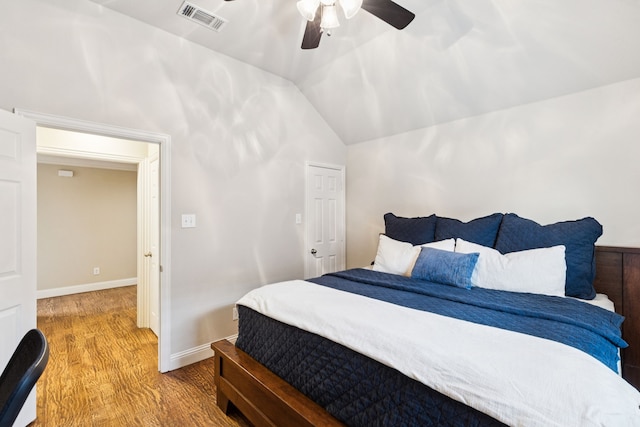 2778 Hidden Knoll Trl, Frisco, TX 75034 - bedroom featuring wood finished floors, lofted ceiling, and a ceiling fan