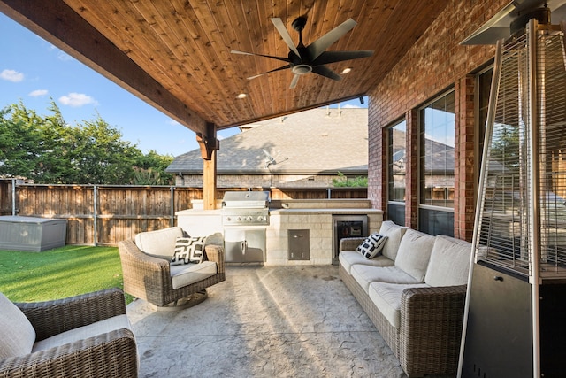 2778 Hidden Knoll Trl, Frisco, TX 75034 - fenced backyard with an outdoor kitchen, a patio, a ceiling fan, and outdoor lounge area