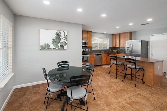 2115 Highland River Dr, Wylie, TX 75098 - dining space featuring recessed lighting and baseboards