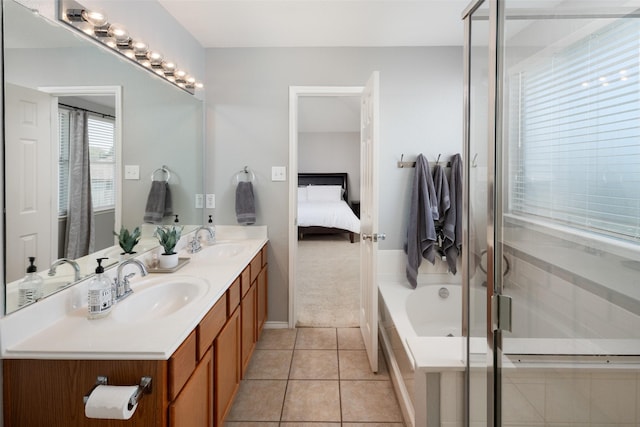 2115 Highland River Dr, Wylie, TX 75098 - bathroom featuring double vanity, ensuite bath, a bath, tile patterned floors, and a shower with shower door