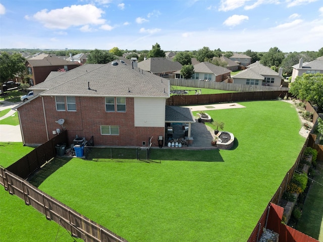 2115 Highland River Dr, Wylie, TX 75098 - rear view of house featuring a residential view, a fenced backyard, and brick siding