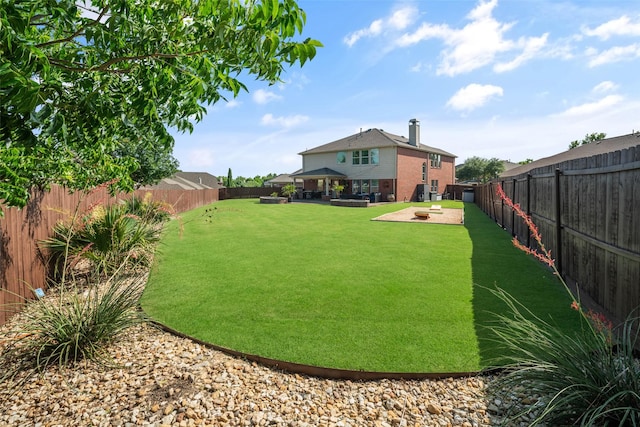 2115 Highland River Dr, Wylie, TX 75098 - fenced backyard featuring a patio area