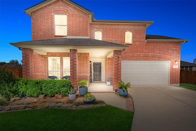 2115 Highland River Dr, Wylie, TX 75098 - view of front facade featuring concrete driveway, brick siding, and roof with shingles