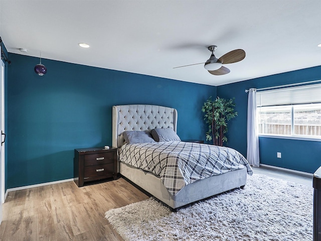 2032 Christie Ln, Carrollton, TX 75007 - bedroom featuring wood finished floors, a ceiling fan, and recessed lighting