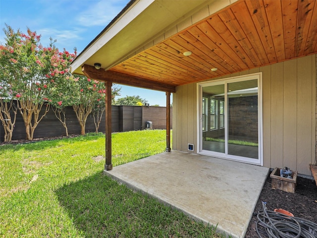 2032 Christie Ln, Carrollton, TX 75007 - fenced backyard with a patio