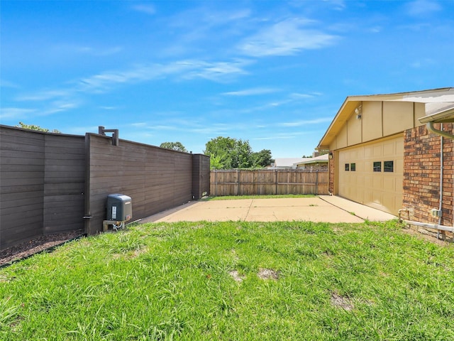 2032 Christie Ln, Carrollton, TX 75007 - view of yard with driveway and a garage
