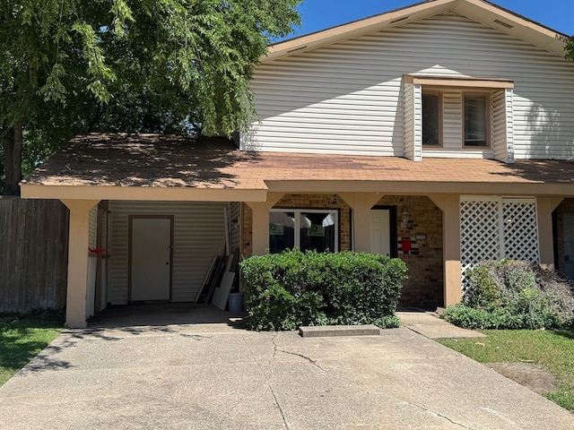 711 Ticonderoga Dr, Garland, TX 75043 - view of front of home featuring driveway and brick siding