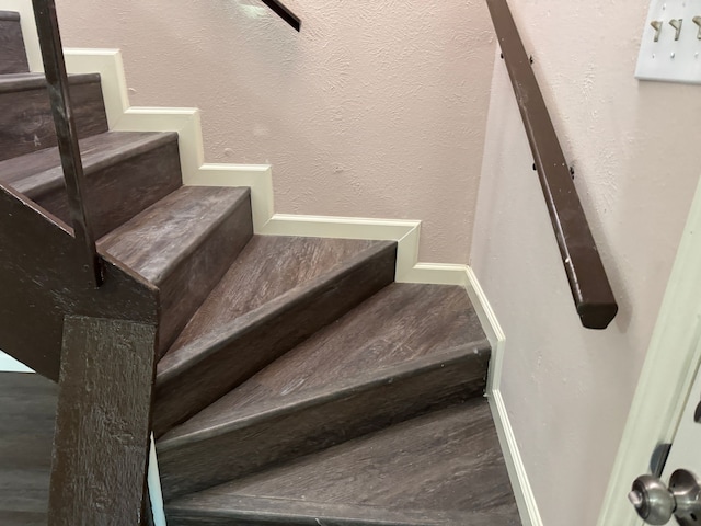 711 Ticonderoga Dr, Garland, TX 75043 - stairs with a textured wall