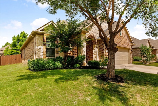 3408 Glen Crest Ln, Denton, TX 76208 - view of front of house with a garage, driveway, brick siding, and stone siding