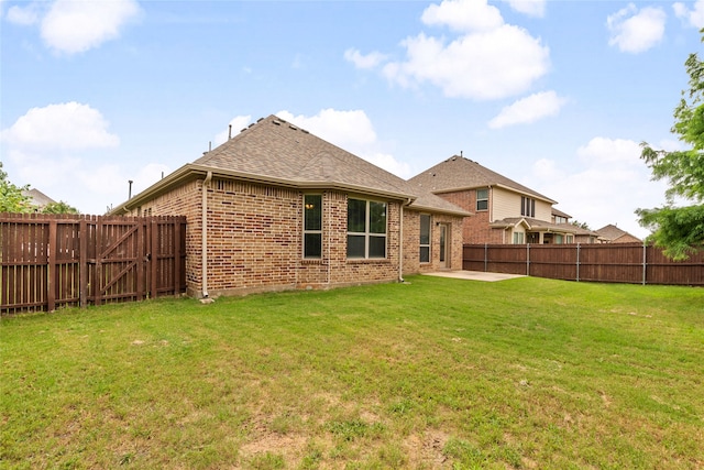 3408 Glen Crest Ln, Denton, TX 76208 - back of house featuring a patio, brick siding, a fenced backyard, and roof with shingles