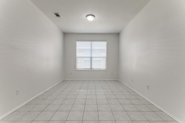 4908 Blue Top Dr, Fort Worth, TX 76179 - spare room featuring light tile patterned flooring and baseboards