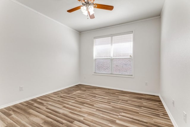 4908 Blue Top Dr, Fort Worth, TX 76179 - empty room featuring a ceiling fan, wood finished floors, and ornamental molding