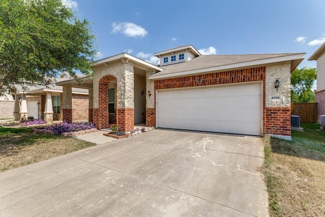 4908 Blue Top Dr, Fort Worth, TX 76179 - view of front facade with brick siding, concrete driveway, and an attached garage