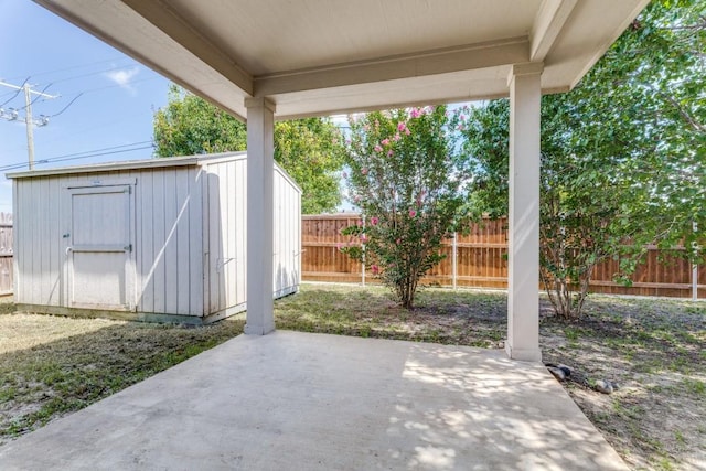 4908 Blue Top Dr, Fort Worth, TX 76179 - fenced backyard with a patio and a storage shed