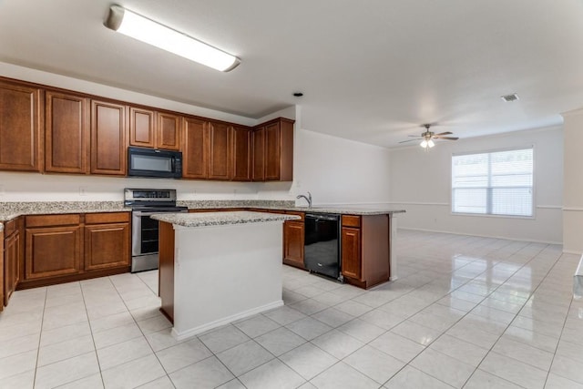 4908 Blue Top Dr, Fort Worth, TX 76179 - kitchen featuring black appliances, light tile patterned flooring, ceiling fan, a peninsula, and a kitchen island