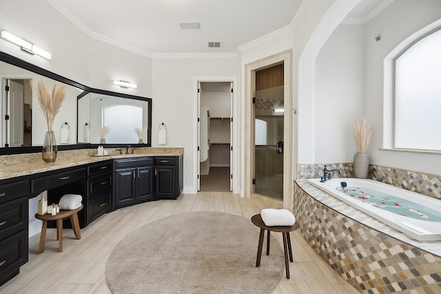 149 Silver Valley Ln, Fort Worth, TX 76108 - full bathroom with vanity, a shower stall, a garden tub, crown molding, and a spacious closet