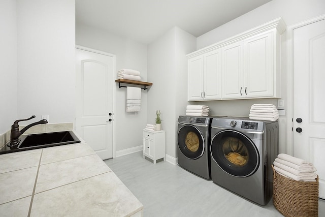 149 Silver Valley Ln, Fort Worth, TX 76108 - laundry room featuring cabinet space and separate washer and dryer