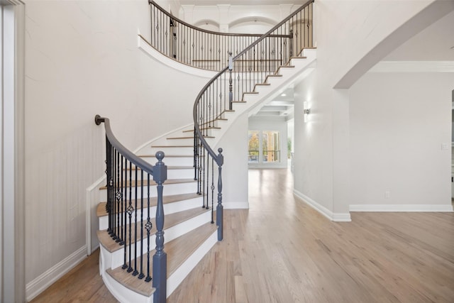 149 Silver Valley Ln, Fort Worth, TX 76108 - staircase with wood finished floors, a towering ceiling, and ornamental molding