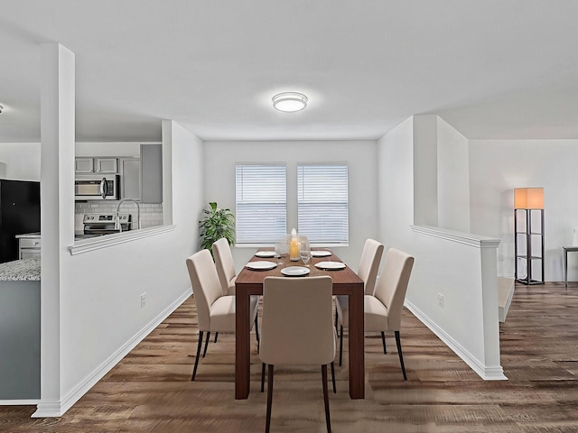 2321 Live Oak Dr, Little Elm, TX 75068 - dining room featuring wood finished floors and baseboards