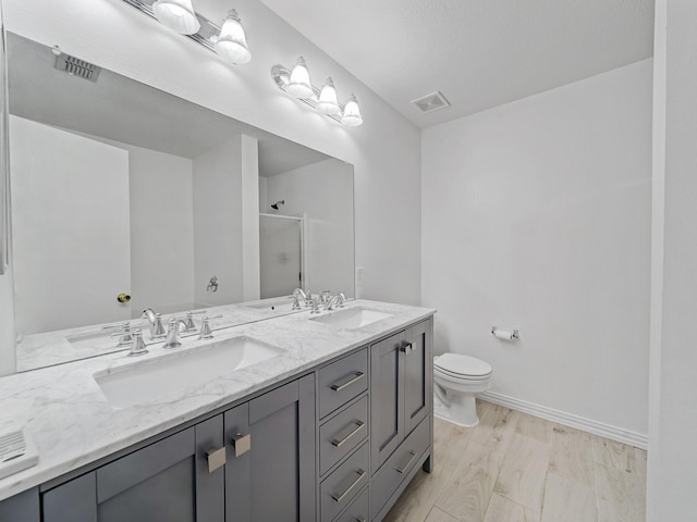 2321 Live Oak Dr, Little Elm, TX 75068 - full bathroom with a shower with shower door and double vanity