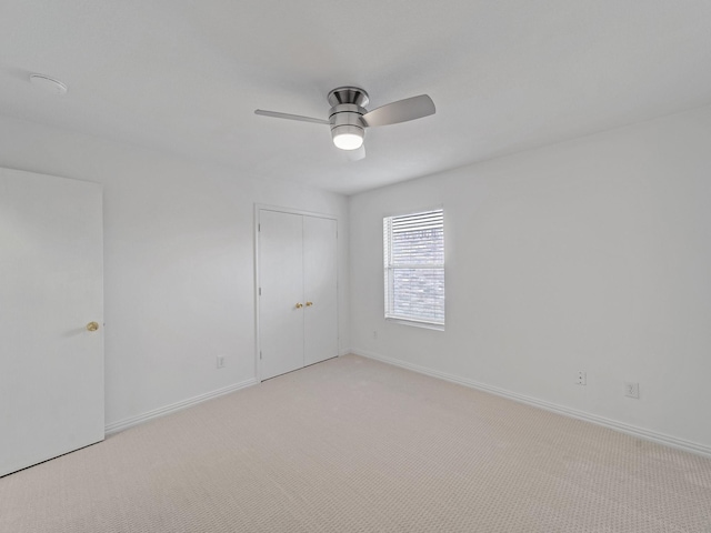 2321 Live Oak Dr, Little Elm, TX 75068 - unfurnished bedroom featuring light carpet, a closet, and ceiling fan