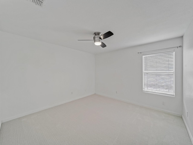 2321 Live Oak Dr, Little Elm, TX 75068 - spare room featuring light colored carpet and ceiling fan