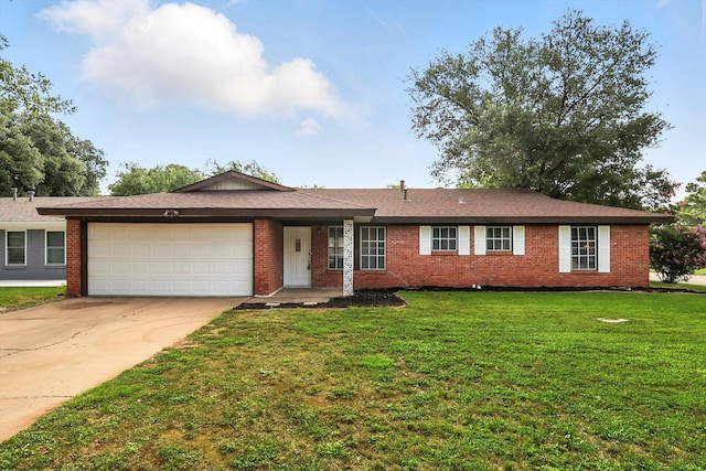 200 Arcadia St, Hurst, TX 76053 - ranch-style home featuring an attached garage, brick siding, concrete driveway, and a front yard