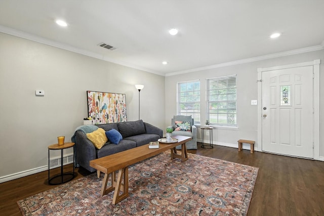 200 Arcadia St, Hurst, TX 76053 - living area featuring dark wood finished floors, ornamental molding, and recessed lighting