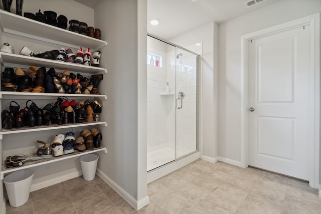 5912 Piedrosa Ct, Denton, TX 76226 - bathroom featuring a shower stall and tile patterned flooring