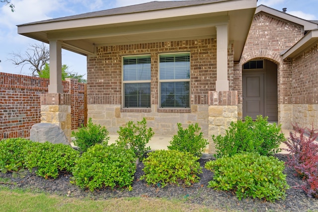 5912 Piedrosa Ct, Denton, TX 76226 - doorway to property featuring brick siding and stone siding