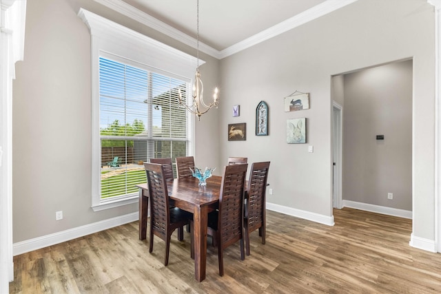 10309 Creekside Ln, Waco, TX 76712 - dining room with ornamental molding, wood finished floors, and a chandelier