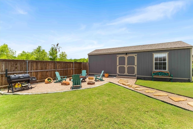 10309 Creekside Ln, Waco, TX 76712 - view of yard featuring a fire pit, a storage shed, and a patio area