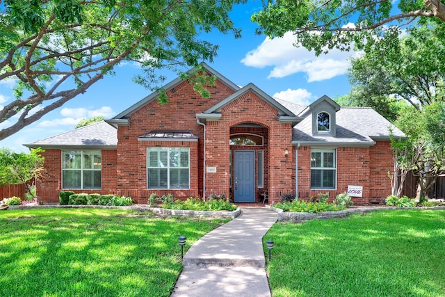 5405 Enfield Dr, Richardson, TX 75082 - traditional-style home featuring brick siding and a shingled roof