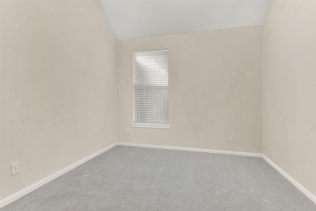5405 Enfield Dr, Richardson, TX 75082 - unfurnished room with vaulted ceiling and carpet