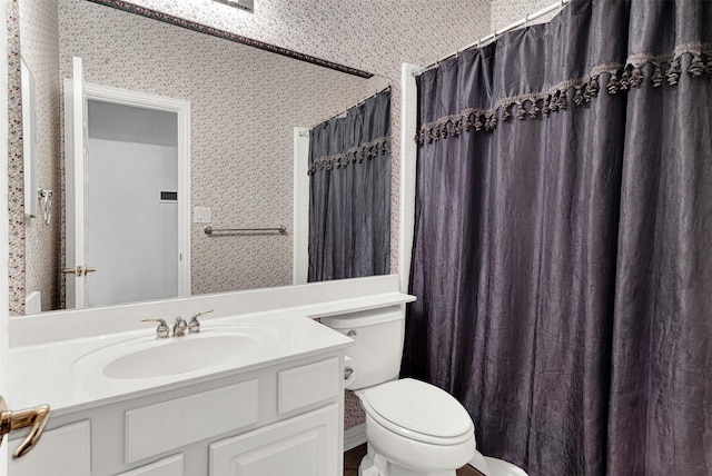5405 Enfield Dr, Richardson, TX 75082 - full bath with wallpapered walls, vanity, and a shower with shower curtain