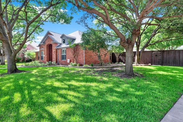 5405 Enfield Dr, Richardson, TX 75082 - traditional-style home with brick siding and a gate