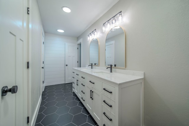 5209 Cordova Ave, Fort Worth, TX 76132 - bathroom with double vanity, tile patterned flooring, and recessed lighting