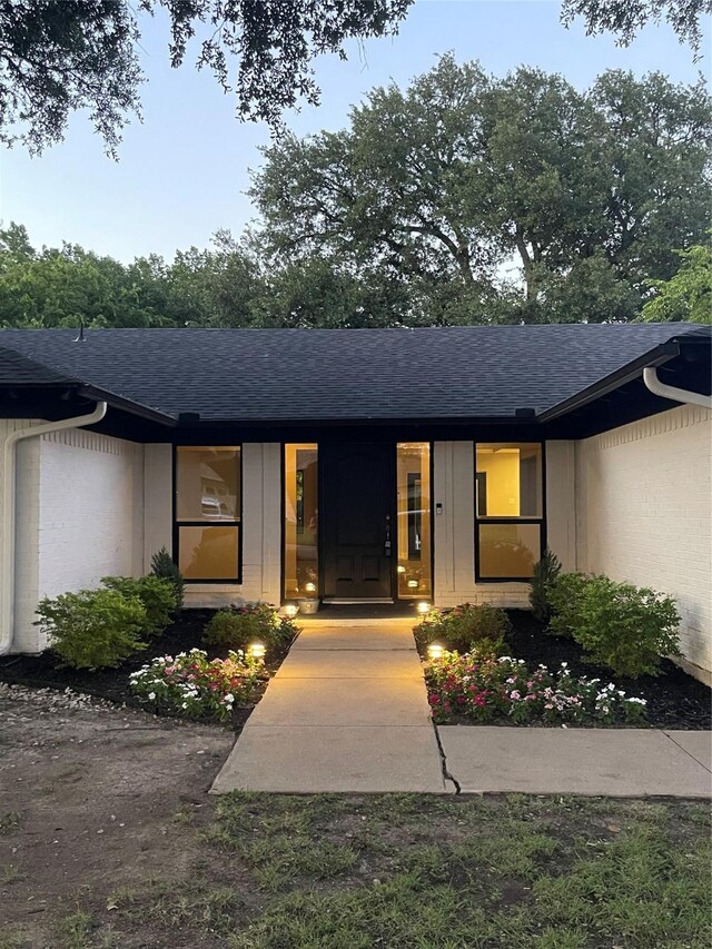 5209 Cordova Ave, Fort Worth, TX 76132 - entrance to property with roof with shingles and brick siding