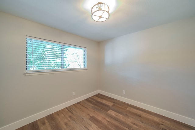 5209 Cordova Ave, Fort Worth, TX 76132 - unfurnished room with baseboards and wood finished floors
