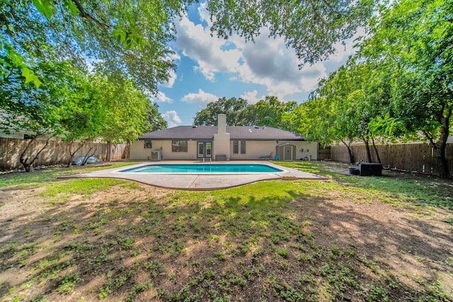5209 Cordova Ave, Fort Worth, TX 76132 - back of house featuring a fenced backyard and a chimney