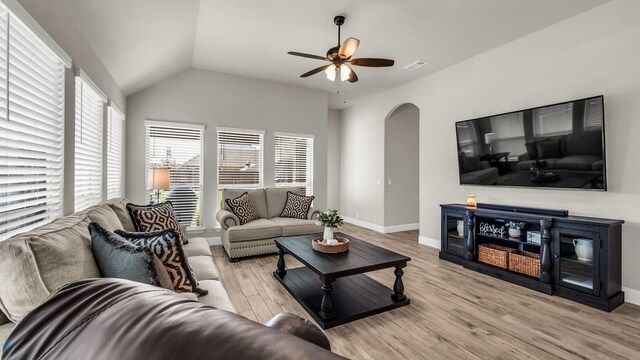 602 Franklin Ln, Lavon, TX 75166 - living area featuring light wood-type flooring, ceiling fan, arched walkways, and lofted ceiling