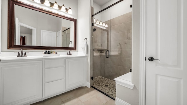 602 Franklin Ln, Lavon, TX 75166 - full bath featuring a stall shower, tile patterned flooring, and double vanity