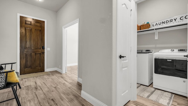 602 Franklin Ln, Lavon, TX 75166 - laundry room featuring separate washer and dryer and light wood-style floors
