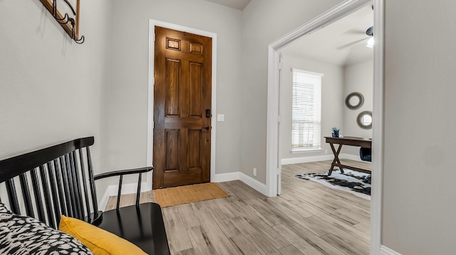 602 Franklin Ln, Lavon, TX 75166 - foyer entrance with light wood finished floors and ceiling fan